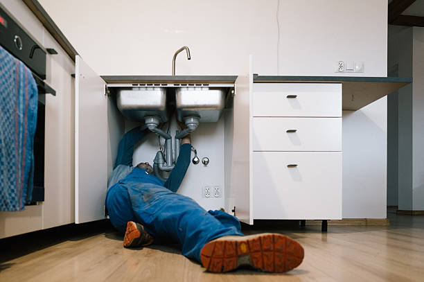 Professional Emergency Plumber technician working in Manson, NC